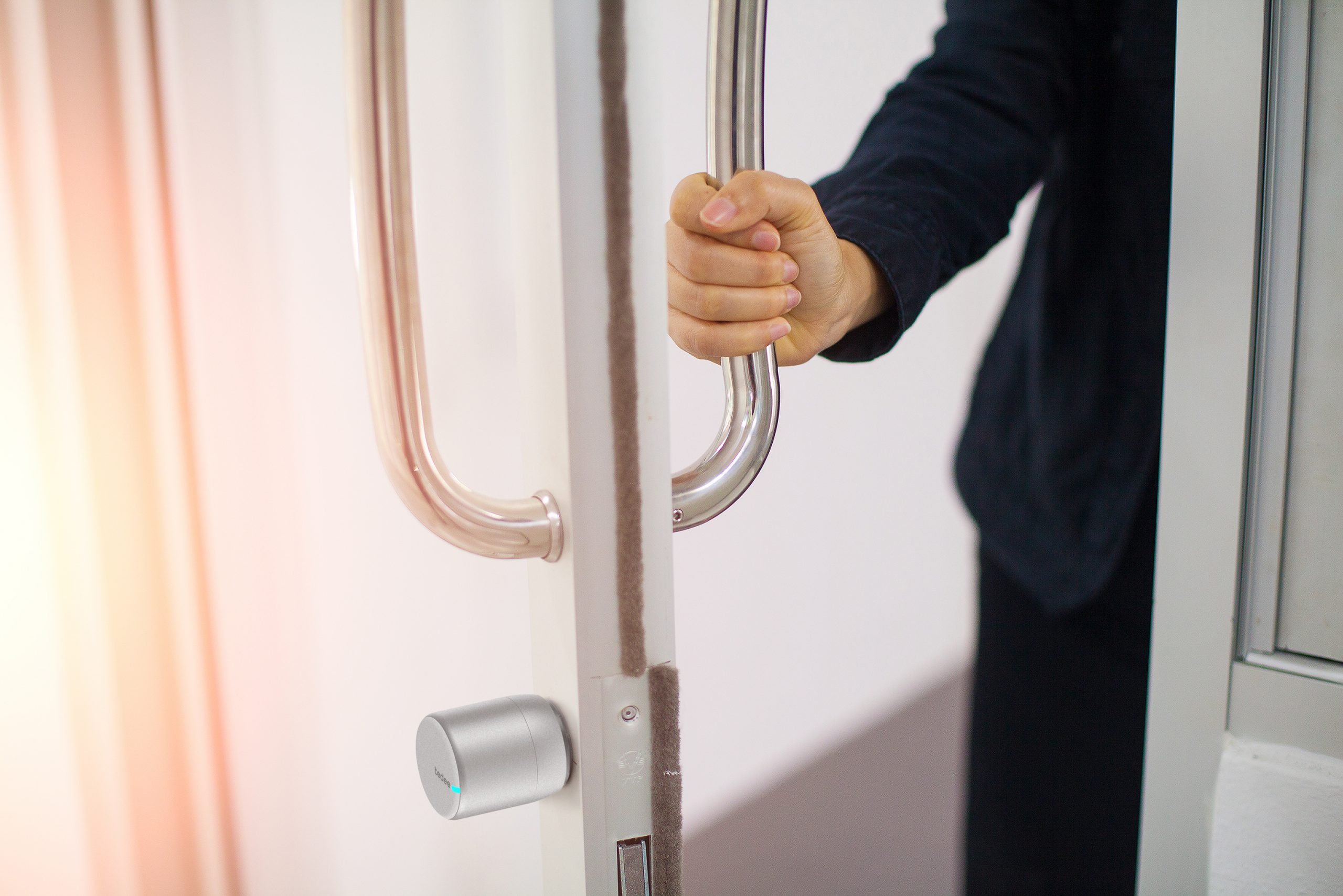 man opening office door