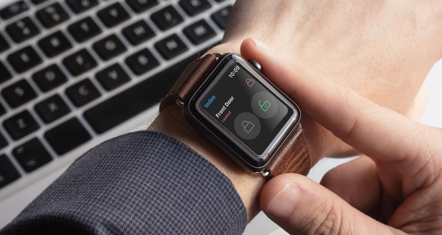 A man managing the tedee app on a smartwatch