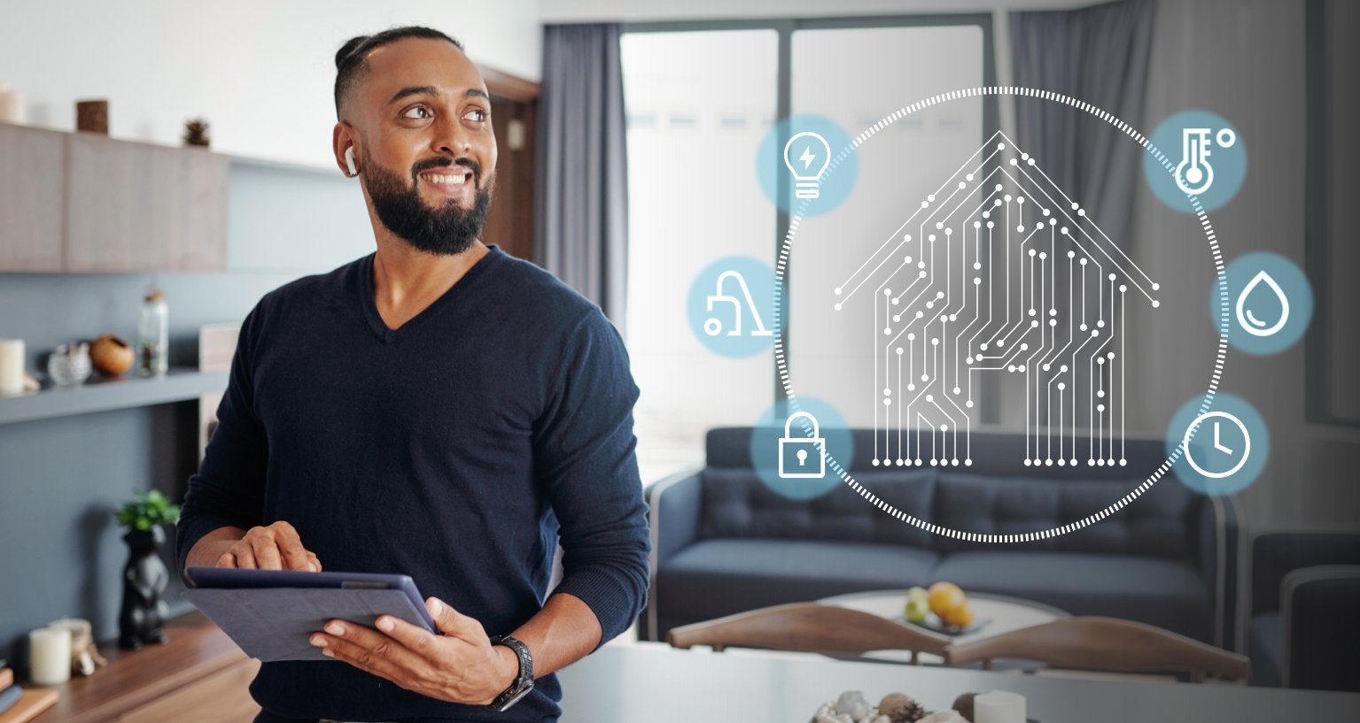 man managing a smart home with a tablet