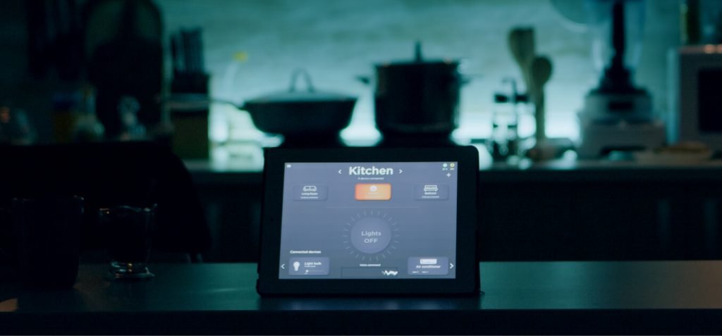 smart home control panel on the kitchen table