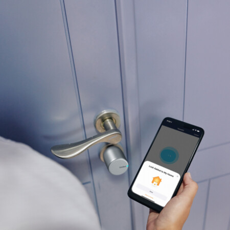 Woman,Using,Security,Control,Application,On,Smartphone,When,Leaving,House